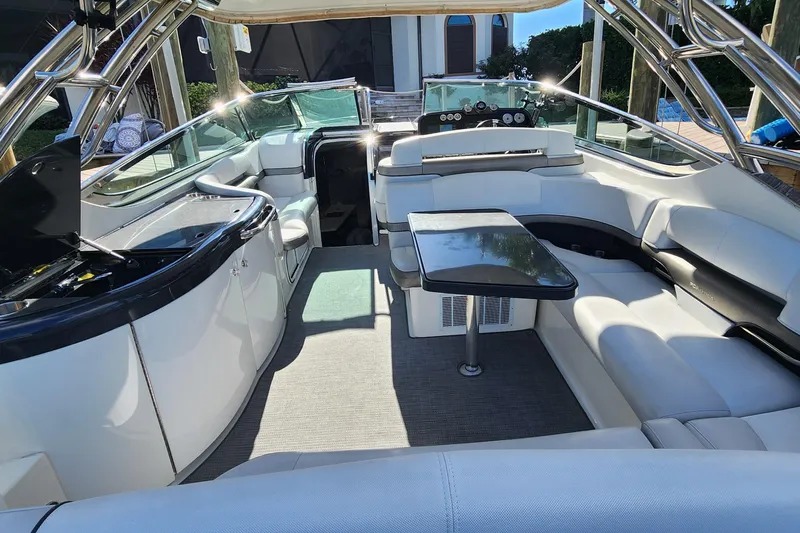 Slide: The Image of 2017 Formula 370 Super Sport boat interior with luxurious seating and sleek design. - 23