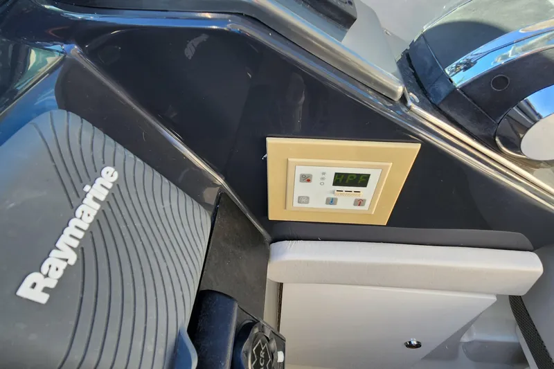 Slide: The Image of Control panel on 2017 Formula 370 Super Sport boat with Raymarine equipment. - 32