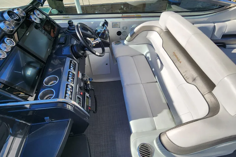 Slide: The Image of 2017 Formula 370 Super Sport cockpit with modern controls and luxurious seating. - 40