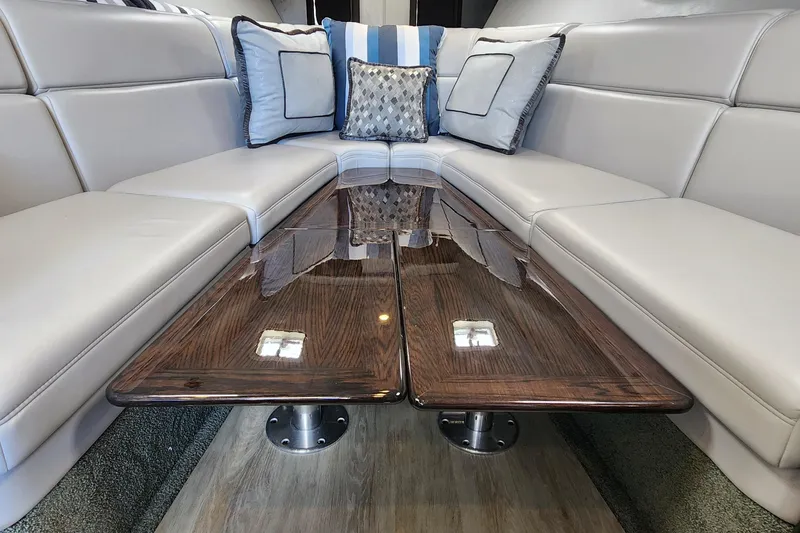 Slide: The Image of Luxurious interior of 2017 Formula 370 Super Sport with elegant seating and polished wood table. - 47