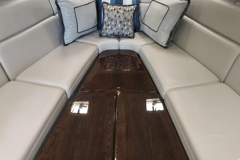 Slide: The Image of Luxurious interior of 2017 Formula 370 Super Sport with elegant seating and decorative pillows. - 48