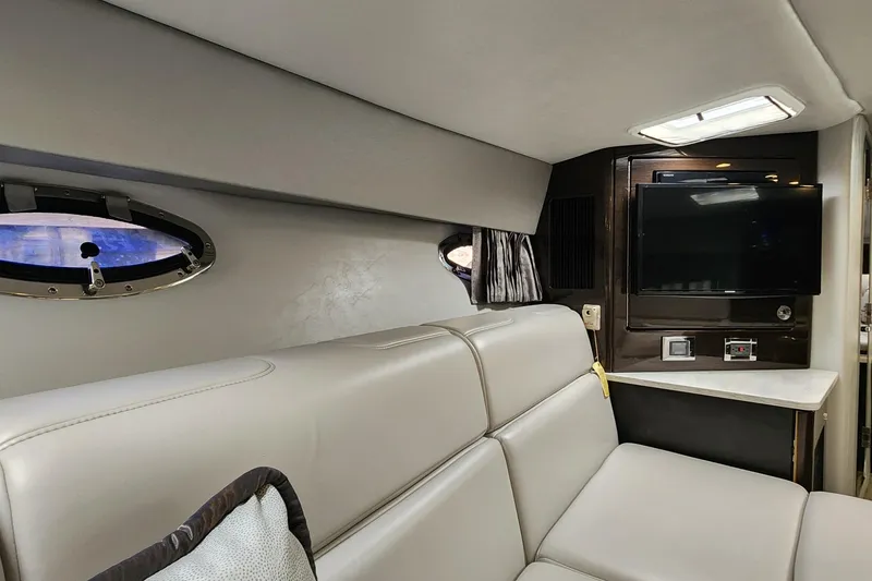 Slide: The Image of Interior of 2017 Formula 370 Super Sport yacht with leather seating and mounted TV. - 52