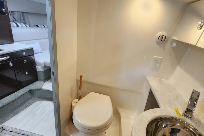 Slide: The Image of 2017 Formula 370 Super Sport yacht interior bathroom with modern amenities. - 54