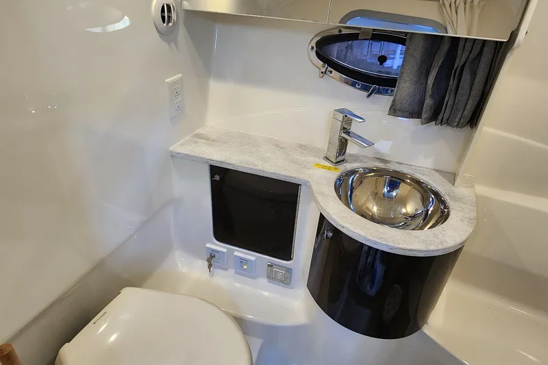 Slide: The Image of 2017 Formula 370 Super Sport yacht bathroom with modern sink and fixtures. - 55