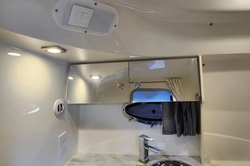 Slide: The Image of Interior of 2017 Formula 370 Super Sport boat bathroom with mirror and sink. - 57