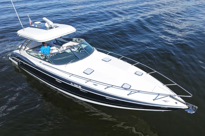 Slide: The Image of 2017 Formula 370 Super Sport boat cruising on open water. - 6