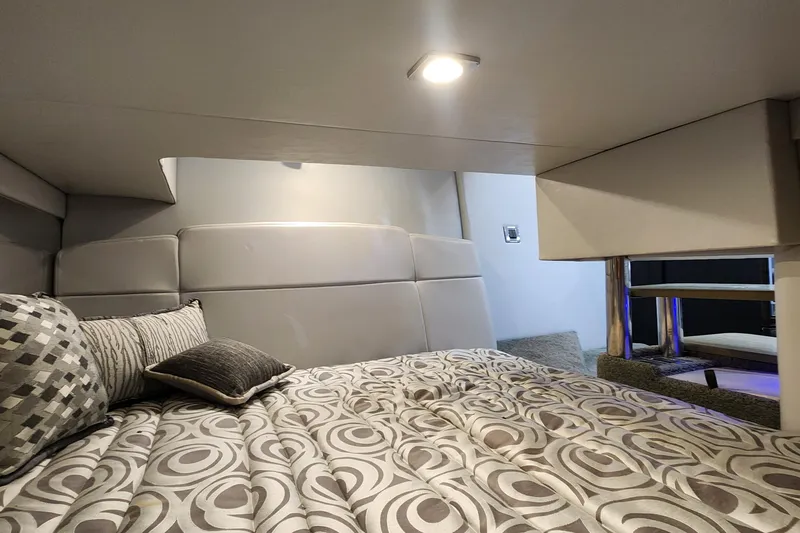 Slide: The Image of Interior cabin of 2017 Formula 370 Super Sport with modern bedding and ambient lighting. - 63