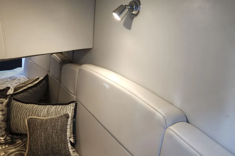 Slide: The Image of Interior of 2017 Formula 370 Super Sport with plush seating and decorative pillows. - 64