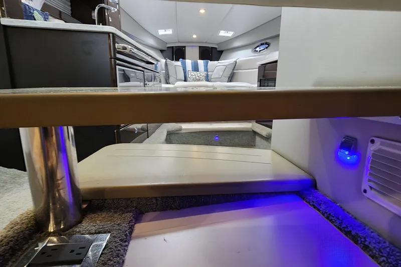 Slide: The Image of Interior of 2017 Formula 370 Super Sport yacht, featuring modern design and ambient lighting. - 65