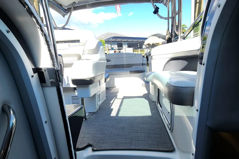 Slide: The Image of Interior view of 2017 Formula 370 Super Sport boat, featuring sleek seating and modern design. - 67