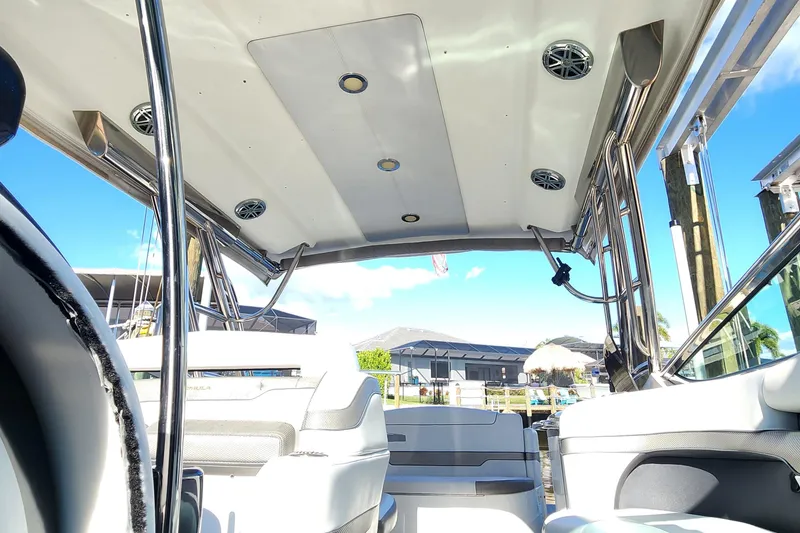 Slide: The Image of Interior view of 2017 Formula 370 Super Sport boat with seating and canopy. - 68