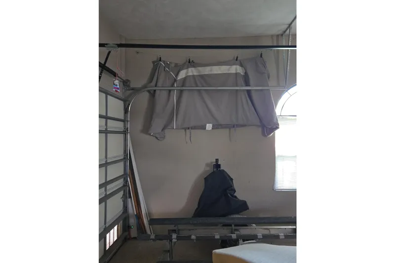 Slide: The Image of Garage interior with a covered Formula 370 Super Sport boat, 2017 model. - 77