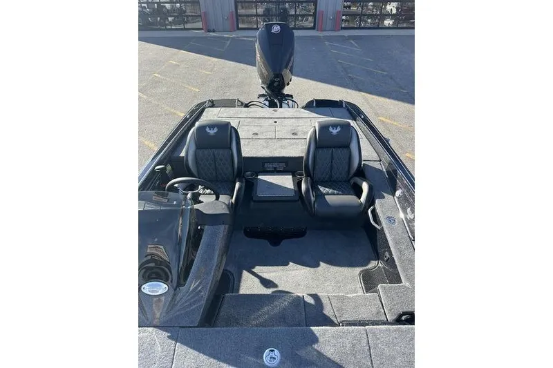 Slide: The Image of 2026 Phoenix 721 ZXL boat interior with dual seats and motor view. - 13