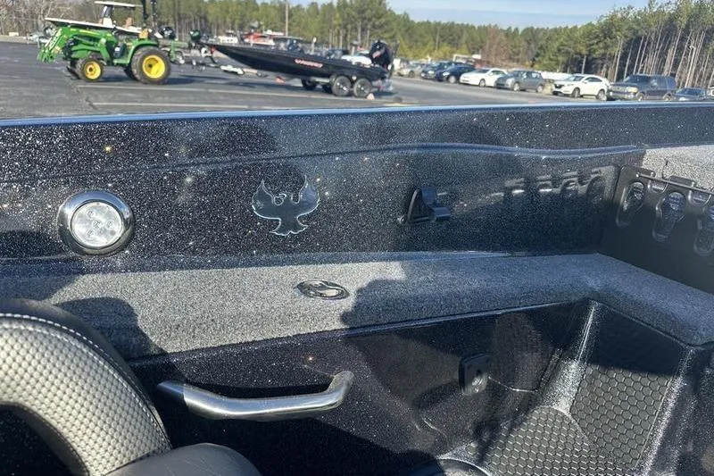 Slide: The Image of Interior view of 2026 Phoenix 721 ZXL boat with dashboard details. - 16