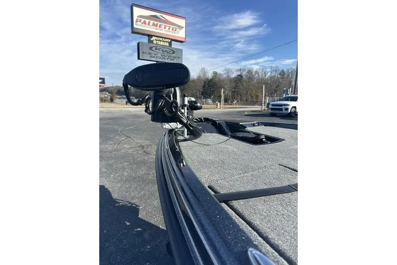 Slide: The Image of 2026 Phoenix 721 ZXL boat at dealership, clear sky, outdoor display. - 3