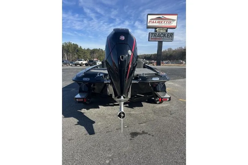 Slide: The Image of 2026 Phoenix 721 ZXL boat with powerful outboard motor in dealership lot. - 5