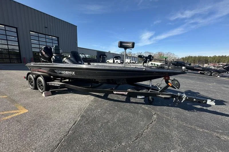 Slide: The Image of 2026 Phoenix 721 ZXL boat on trailer in parking lot, sunny day. - 6