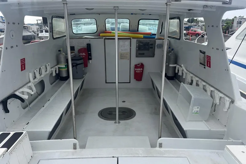 Slide: The Image of Interior of 1988 Custom 36 Hawaiian Lightning Radon boat with seating and equipment. - 14