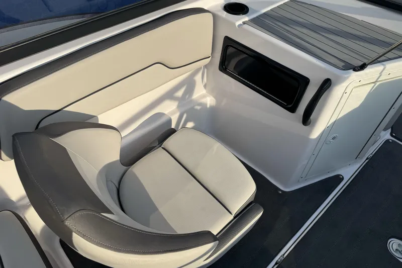 Slide: The Image of 2022 Yamaha Boats SX190 interior seating with sleek design and modern features. - 16