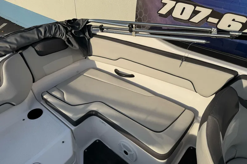 Slide: The Image of 2022 Yamaha Boats SX190 interior seating with sleek design and comfortable upholstery. - 20