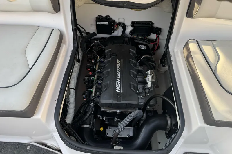 Slide: The Image of 2022 Yamaha Boats SX190 engine compartment with high output motor. - 29