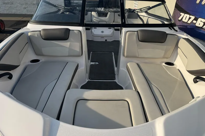 Slide: The Image of 2022 Yamaha Boats SX190 interior with spacious seating and modern design. - 8