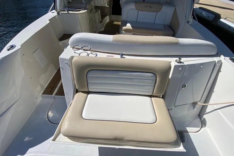 Slide: The Image of 2008 Sea Ray Sundancer 330 boat interior with beige and white seating. - 24