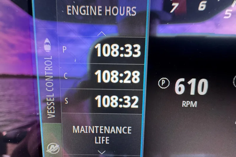 Slide: The Image of Display screen showing engine hours and RPM for 2024 Statement 350 Open vessel. - 23
