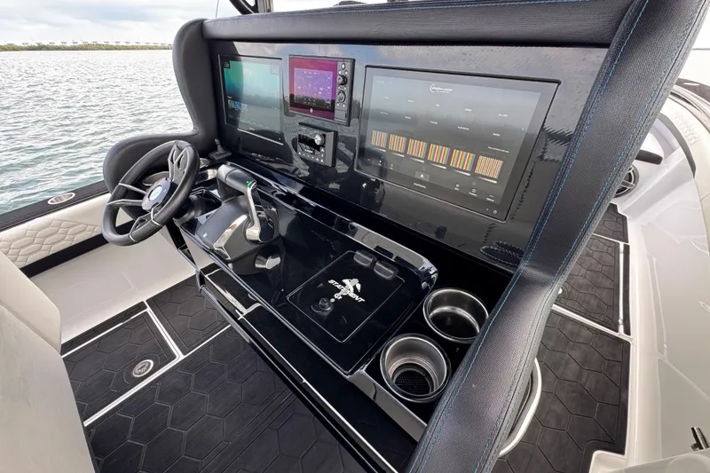 Slide: The Image of 2024 Statement 350 Open boat dashboard with advanced navigation and control systems. - 7