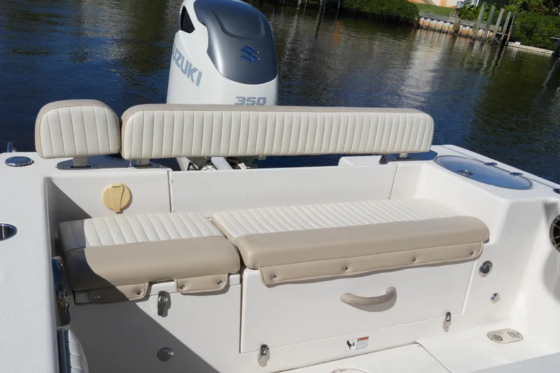 Slide: The Image of 2019 SeaChaser 24 HFC boat with Suzuki 350 engine, featuring comfortable seating. - 15