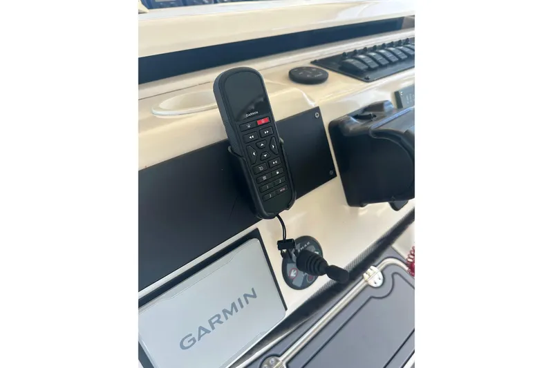 Slide: The Image of Control panel of 2006 Grady-White Express 360 with Garmin marine electronics. - 12