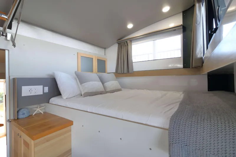 Slide: The Image of Modern Navisyo Homes NV.08 bedroom interior, 2021 model, featuring cozy bed and natural light. - 10