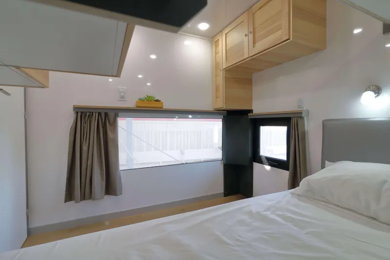 Slide: The Image of Modern bedroom interior in Navisyo Homes NV.08, 2021 model, featuring sleek design and natural light. - 17