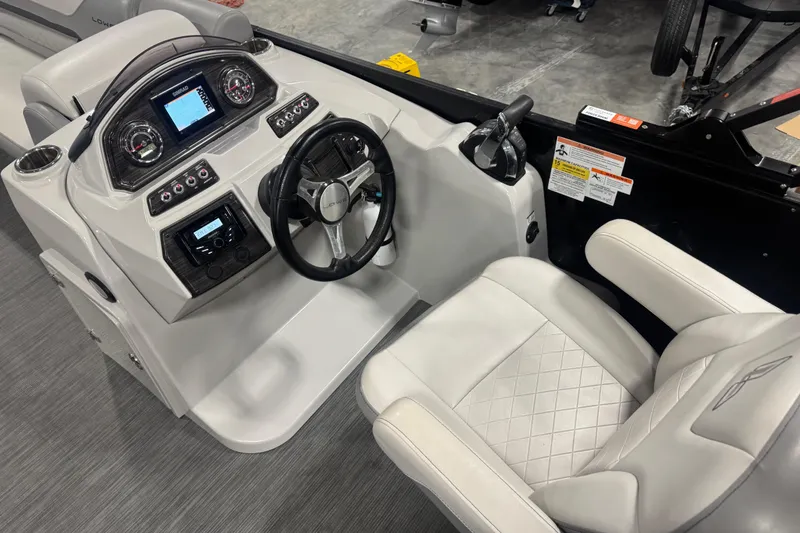 Slide: The Image of 2022 Lowe SS 270 boat cockpit with modern steering and control panel. - 12
