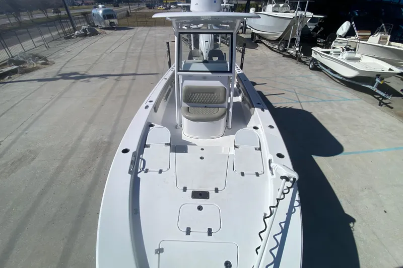 Slide: The Image of 2021 Sportsman Masters 267 Bay Boat, top view, showcasing spacious deck and seating. - 11