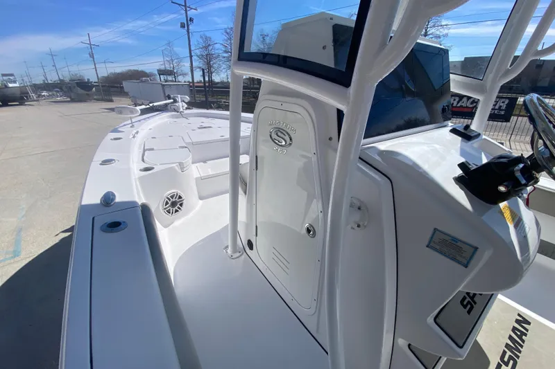 Slide: The Image of 2021 Sportsman Masters 267 Bay Boat, sleek design, spacious deck, modern console. - 16