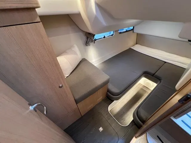 Slide: The Image of 2023 Nimbus 405 Coupé #124 cabin interior with seating and bed. - 39