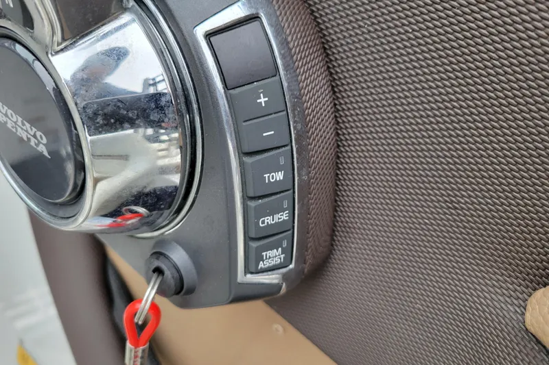 Slide: The Image of Close-up of 2016 Cobalt CS3 boat controls with Volvo Penta branding. - 18