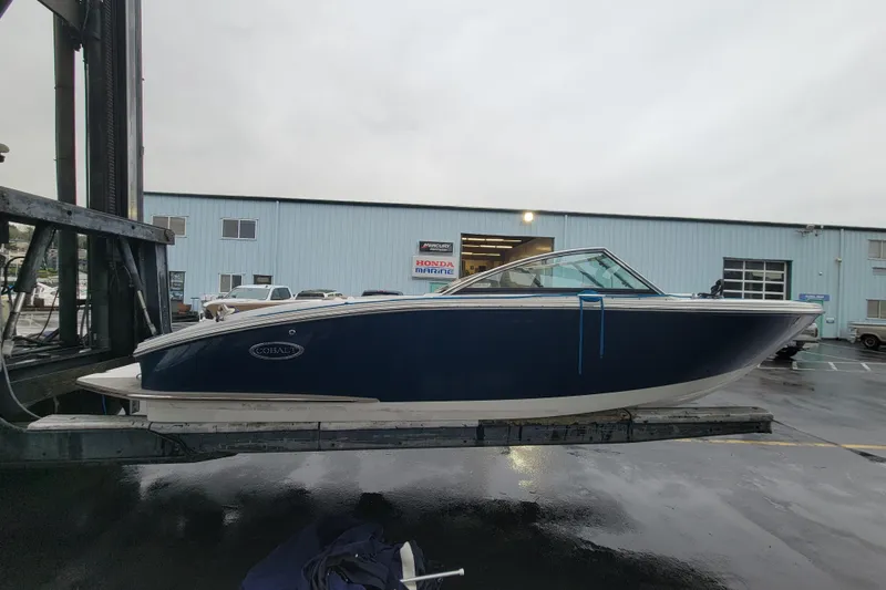 Slide: The Image of 2016 Cobalt CS3 boat on a lift outside a marine service building. - 4