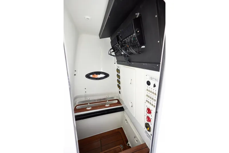 Slide: The Image of 2024 Contender 35 ST interior with control panel and wooden flooring. - 19