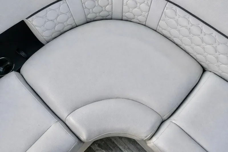 Slide: The Image of Luxurious seating on 2019 Crest 250 LUSD boat with elegant upholstery design. - 12
