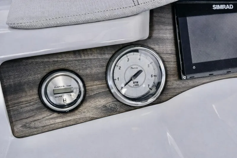 Slide: The Image of Dashboard of 2019 Crest 250 LUSD boat with RPM and elapsed time gauges. - 18