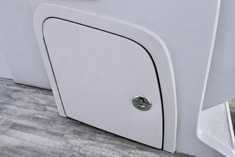 Slide: The Image of 2019 Crest 250 LUSD boat storage compartment with sleek design and secure latch. - 28