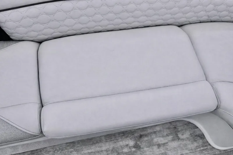 Slide: The Image of Luxurious seating detail of 2019 Crest 250 LUSD boat, featuring elegant quilted upholstery. - 34