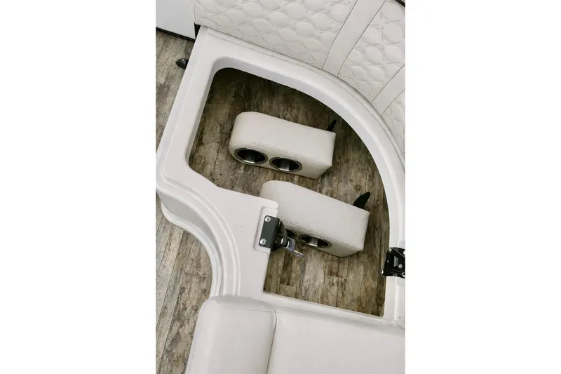 Slide: The Image of 2019 Crest 250 LUSD boat interior with cup holders and quilted seating. - 43
