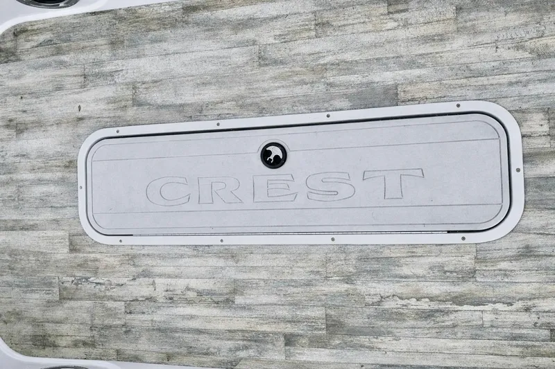 Slide: The Image of 2019 Crest 250 LUSD boat deck with logo on textured surface. - 45