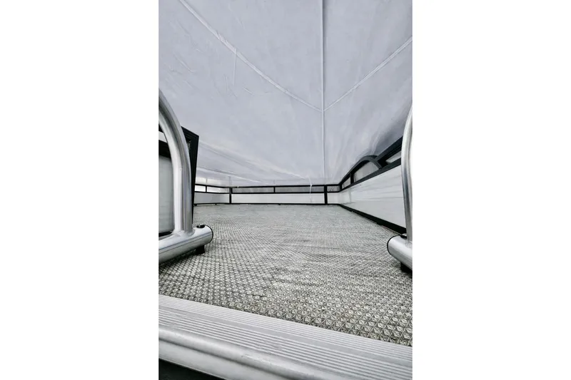 Slide: The Image of 2019 Crest 250 LUSD boat interior with textured flooring and railing. - 5