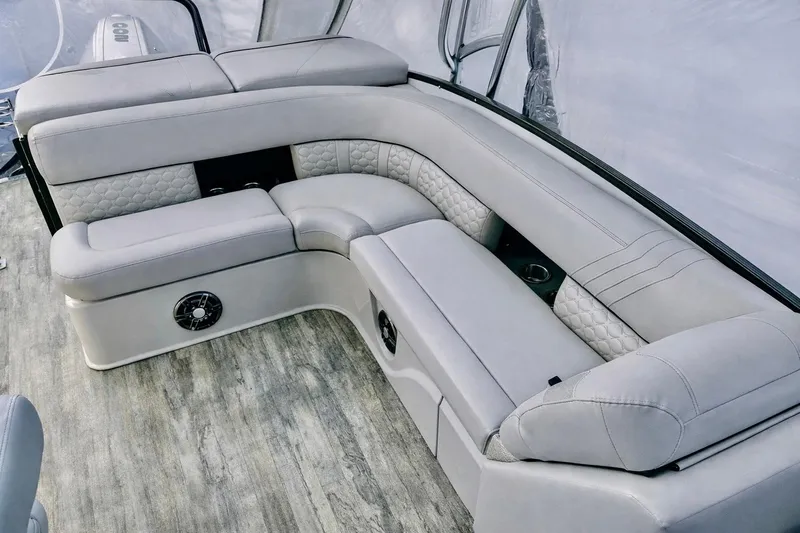 Slide: The Image of Luxurious seating on a 2019 Crest 250 LUSD boat with elegant gray upholstery. - 50