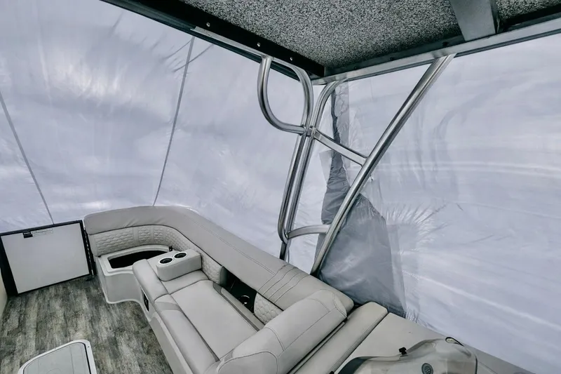 Slide: The Image of 2019 Crest 250 LUSD boat interior with plush seating and modern design. - 54