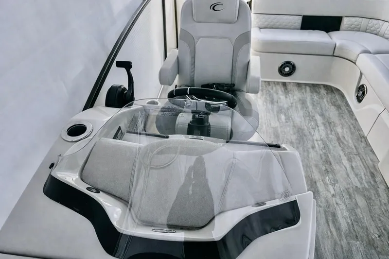 Slide: The Image of 2019 Crest 250 LUSD boat interior with modern helm and seating. - 57